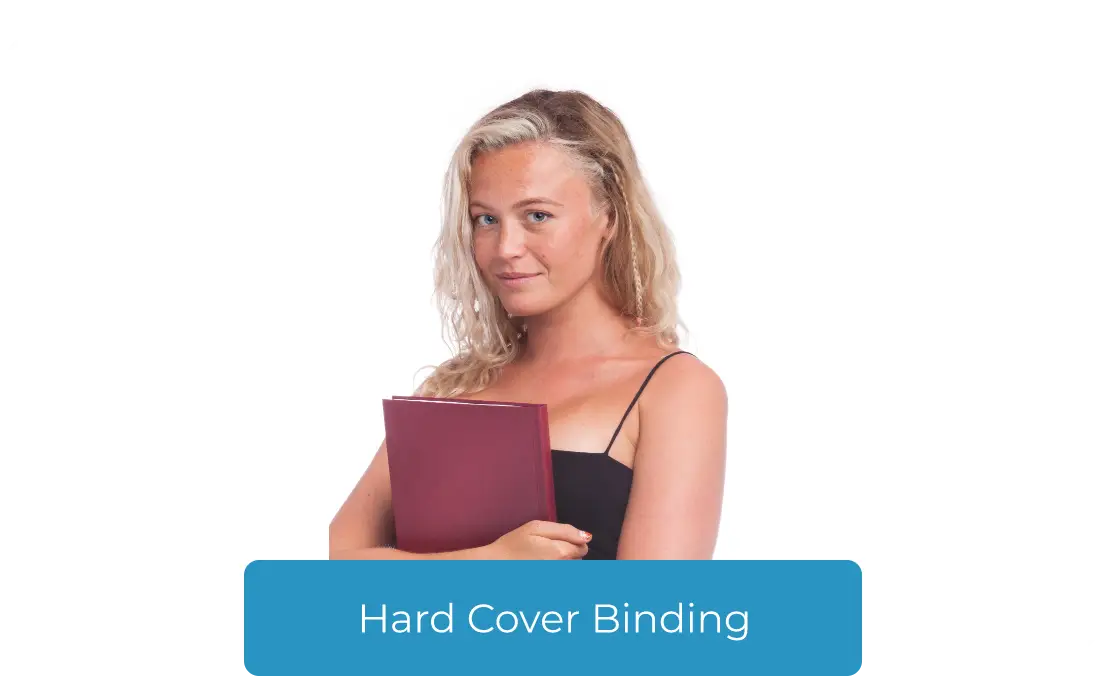A young female is holding a hardcover book