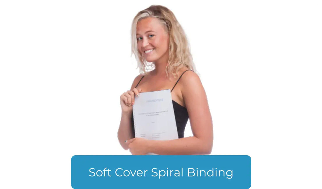 A young female is showing a book with softcover spiral binding